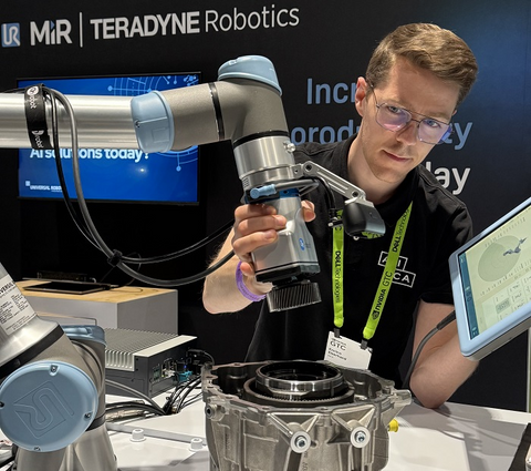 Industrial robot simulation used to generate training data for physical AI