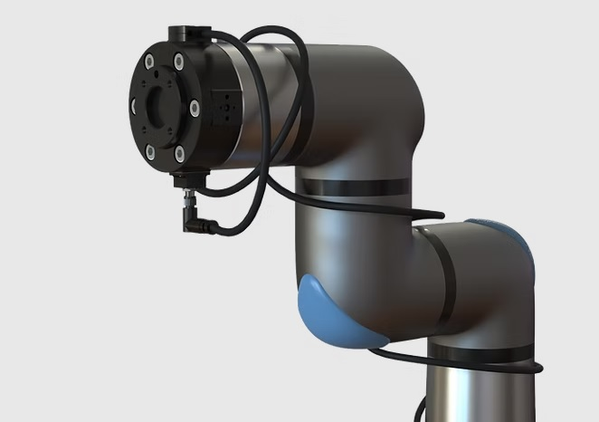Force-torque sensor mounted between an industrial robot wrist and its process tool