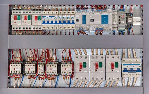 Industrial control cabinet with protective devices and power distribution components