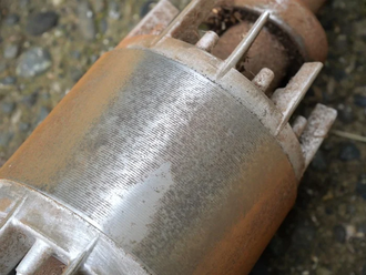 Industrial motor rotor illustrating conductive cores affected by changing magnetic flux